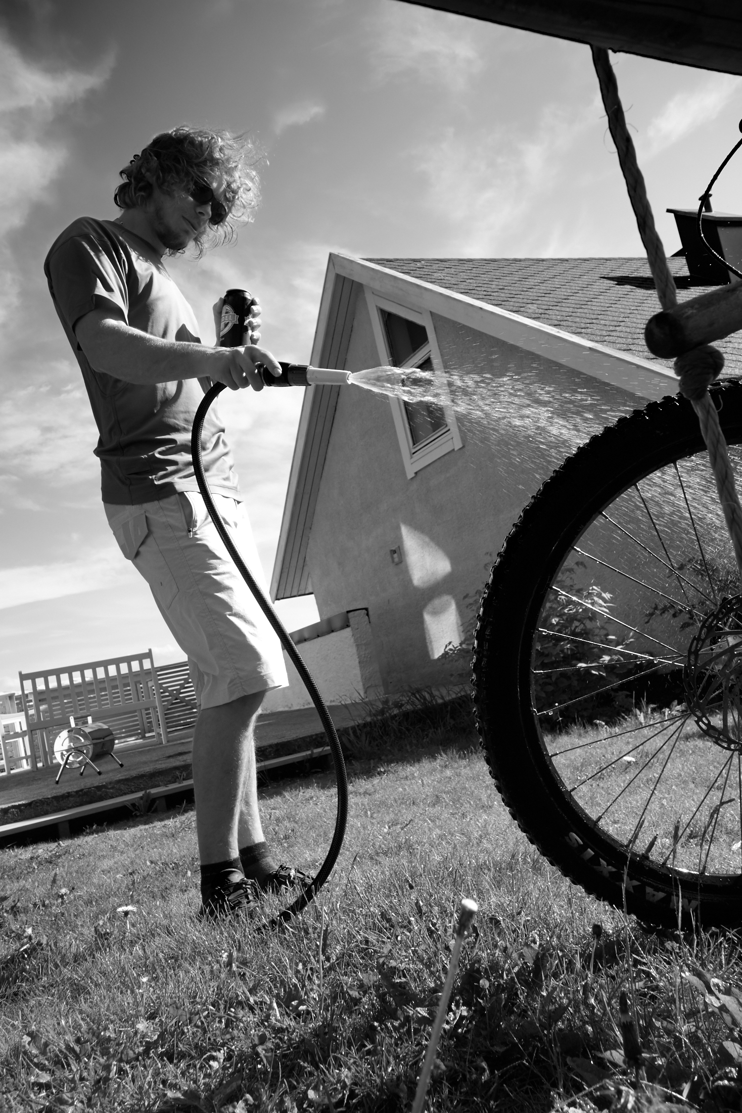 Beers, shorts, t-shirt, and the bbq ready for action in the background. The essence of summer. Pic by Andrea