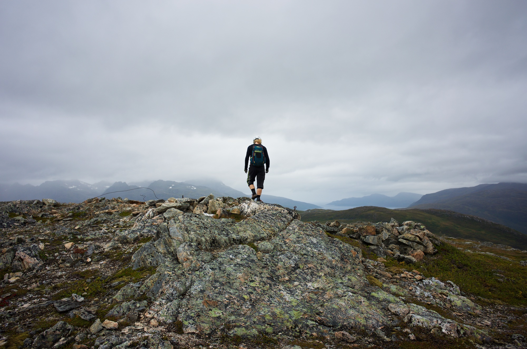 On the summit under grey skies.