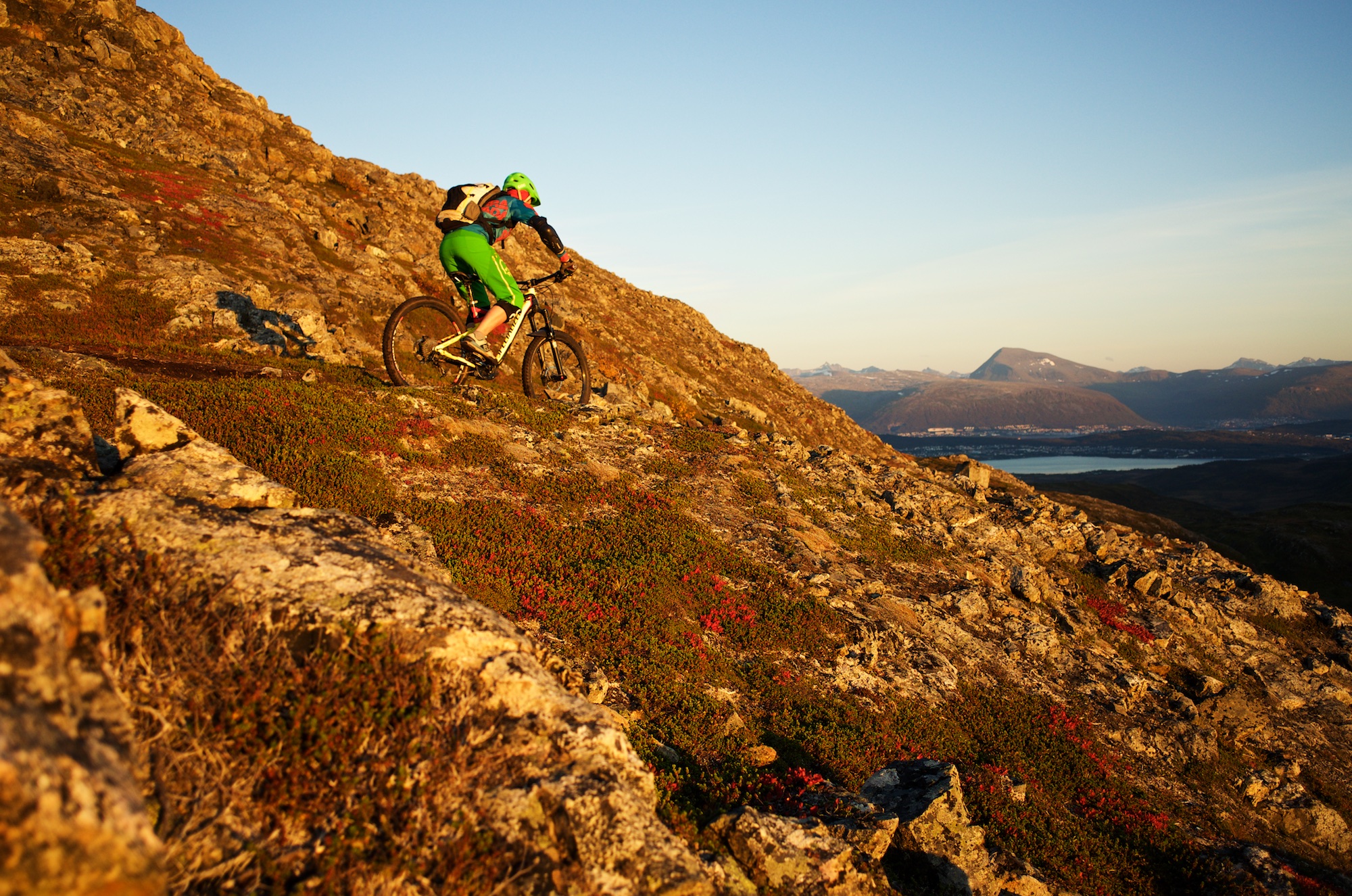 Andrea enjoying one of the flatter bits with Tromsø and Tromsdalstind in the background.