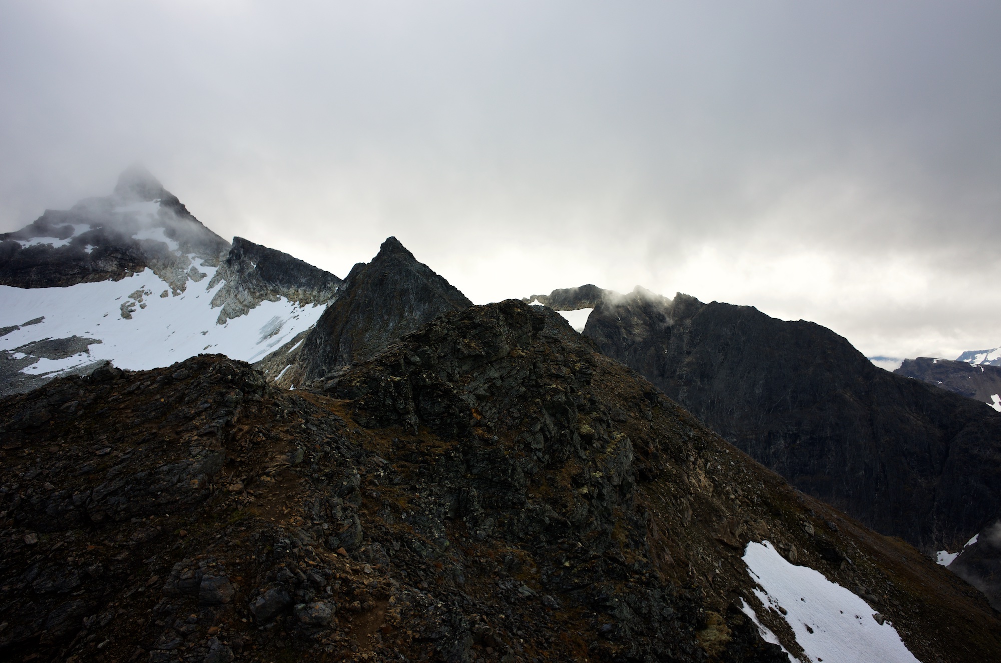 Hamperocken in the clouds. Not for bikinists, at least not us. Riding on belay is where my personal line is drawn, at least right now.