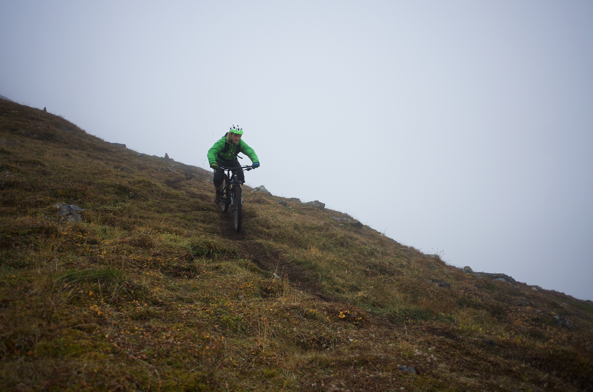 Passing through clouds is just as foggy and wet as one might expect. Notice the roost from the rear wheel.