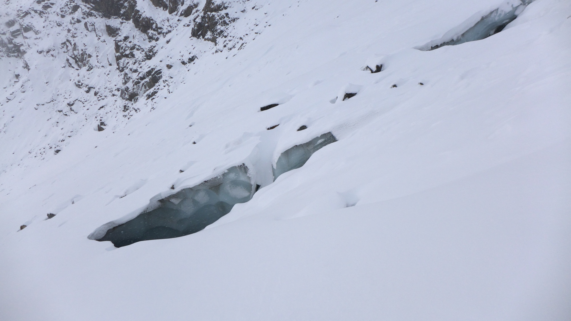 There were a few crevasses lurking around the edges of the glacier, we treaded carefully onwards.