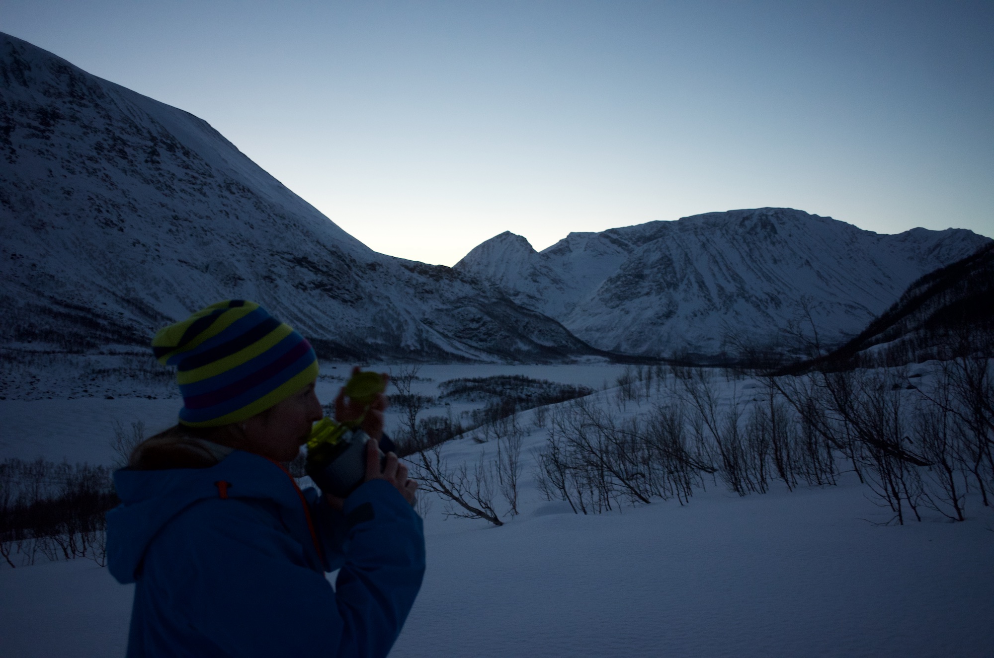 Linnea having a sip of water after we made our way around the not yet safe to cross lake.