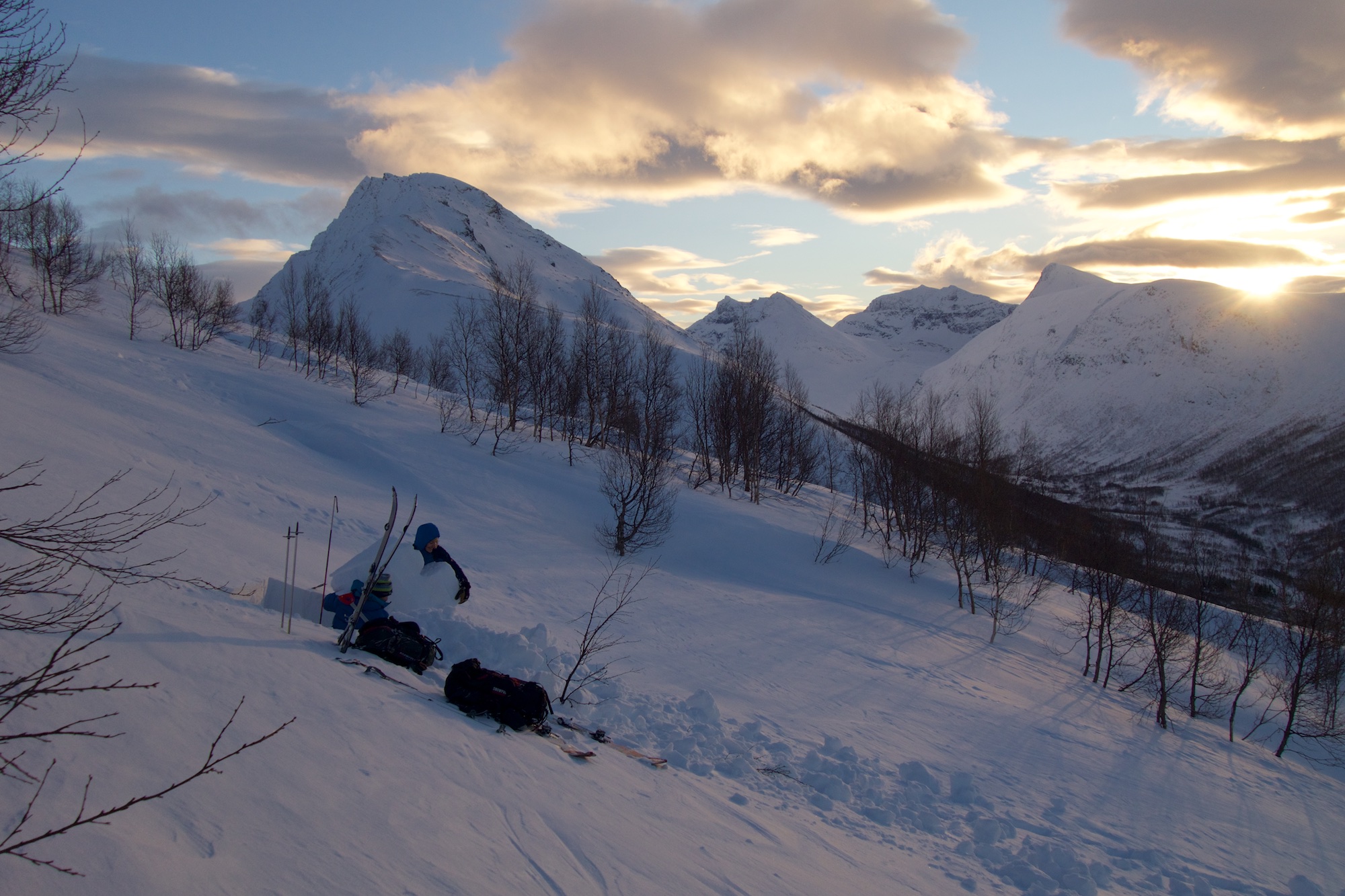 Big slabs of wind loaded snow at treeline, and spectacular light. Photo by Andrea.